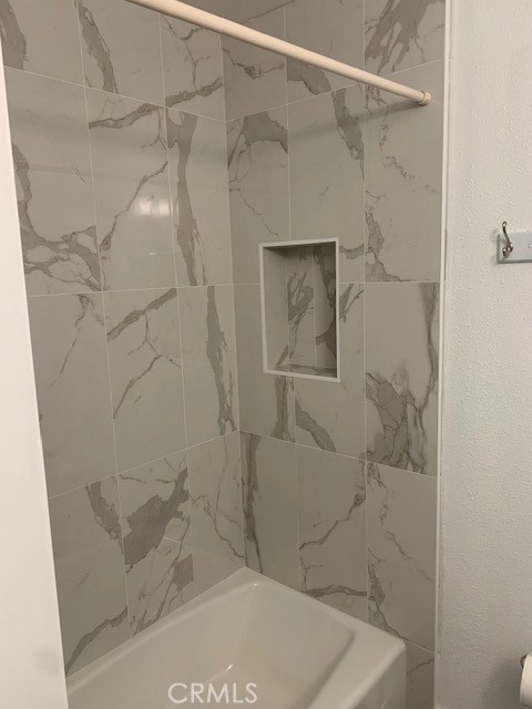 2275 Hazel Road Tustin, CA 92780 - Photo 14 of 25 a bathroom with a shower