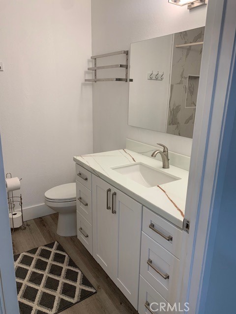 2275 Hazel Road Tustin, CA 92780 - Photo 15 of 25 a bathroom with a sink toilet and shower
