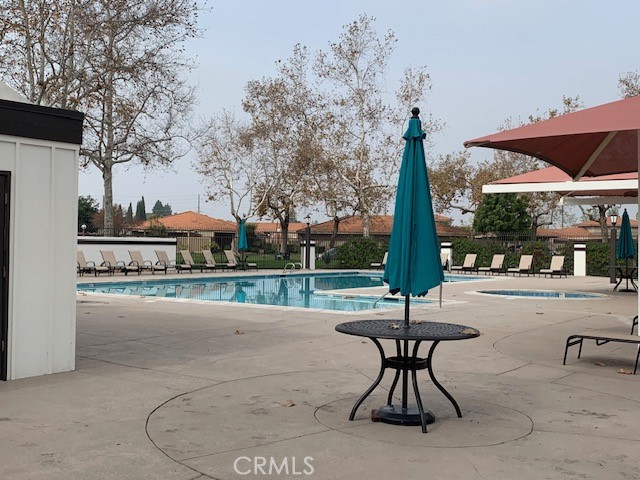 2275 Hazel Road Tustin, CA 92780 - Photo 21 of 25 a table and chairs in the patio