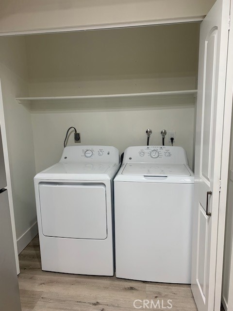 2275 Hazel Road Tustin, CA 92780 - Photo 7 of 25 a utility room with dryer and washer