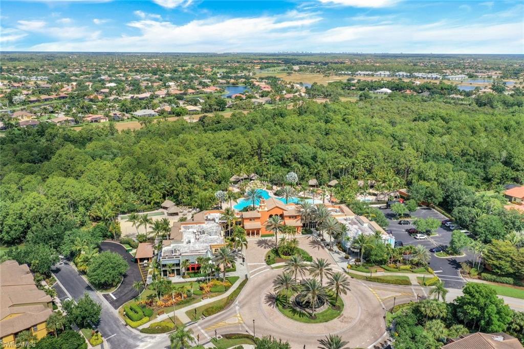 9115 Capistrano Street South, Unit 8207 Naples, FL 34113 - Photo 28 of 29 an aerial view of residential houses with outdoor space