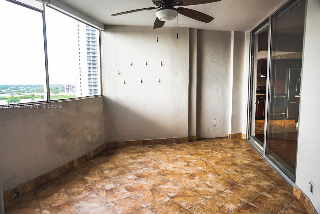 100 Golden Isles Drive, Unit 10 Hallandale Beach, FL 33009 - Photo 18 of 18 a view of an empty room with a window