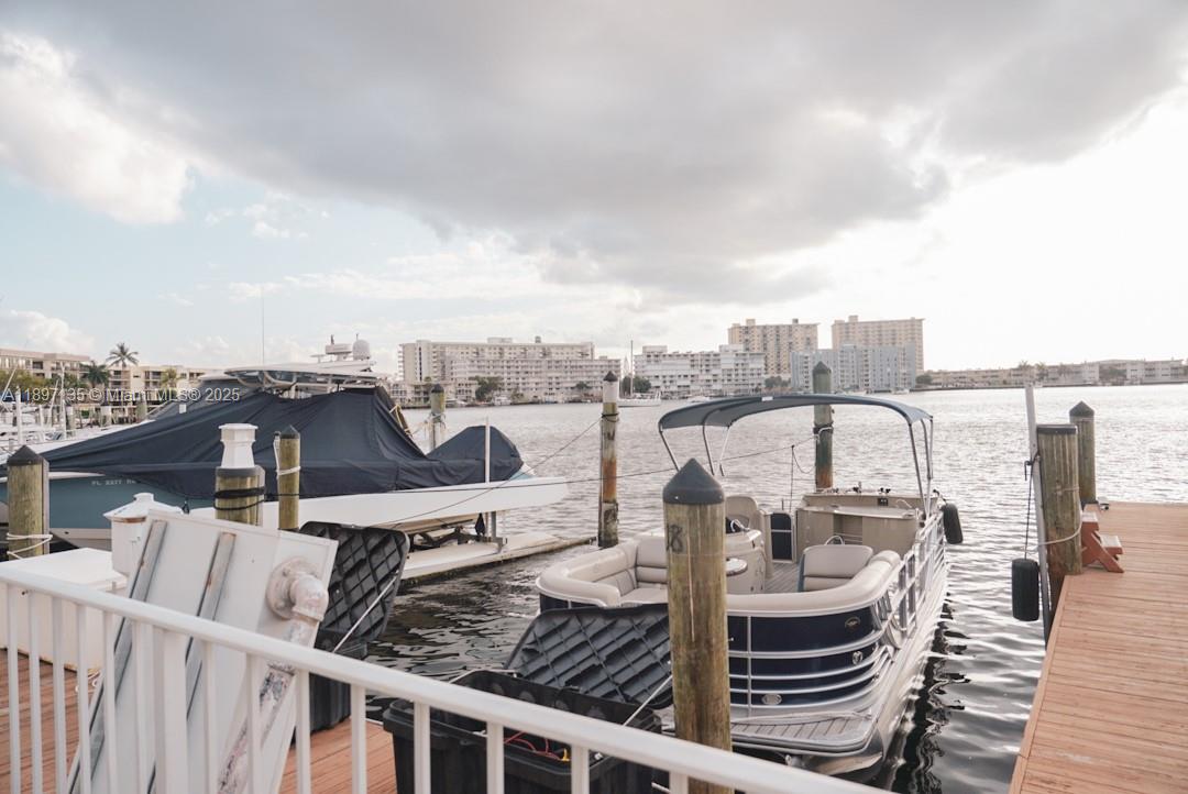 100 Golden Isles Drive, Unit 10 Hallandale Beach, FL 33009 - Photo 2 of 18 a view of a balcony with city view