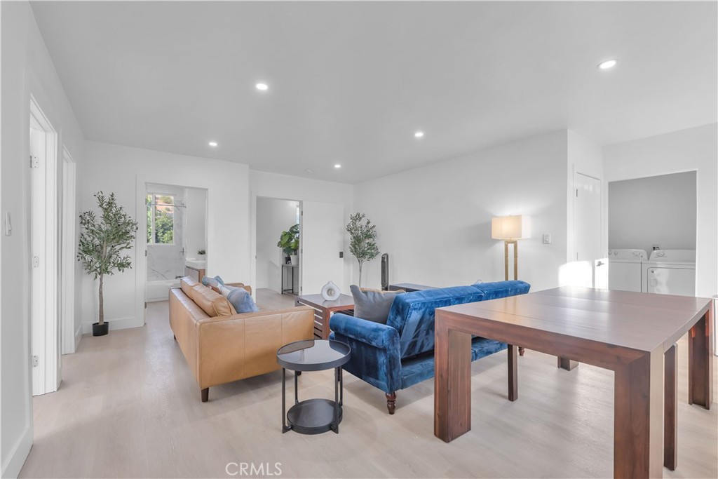 3115 Arvia Street, Unit 1B Los Angeles, CA 90065 - Photo 12 of 27 a living room with furniture and a table