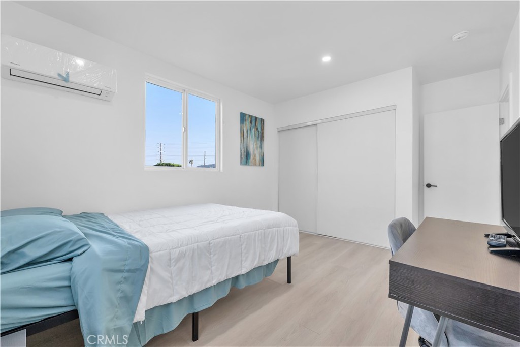 3115 Arvia Street, Unit 1B Los Angeles, CA 90065 - Photo 23 of 27 a bedroom with a bed and a desk