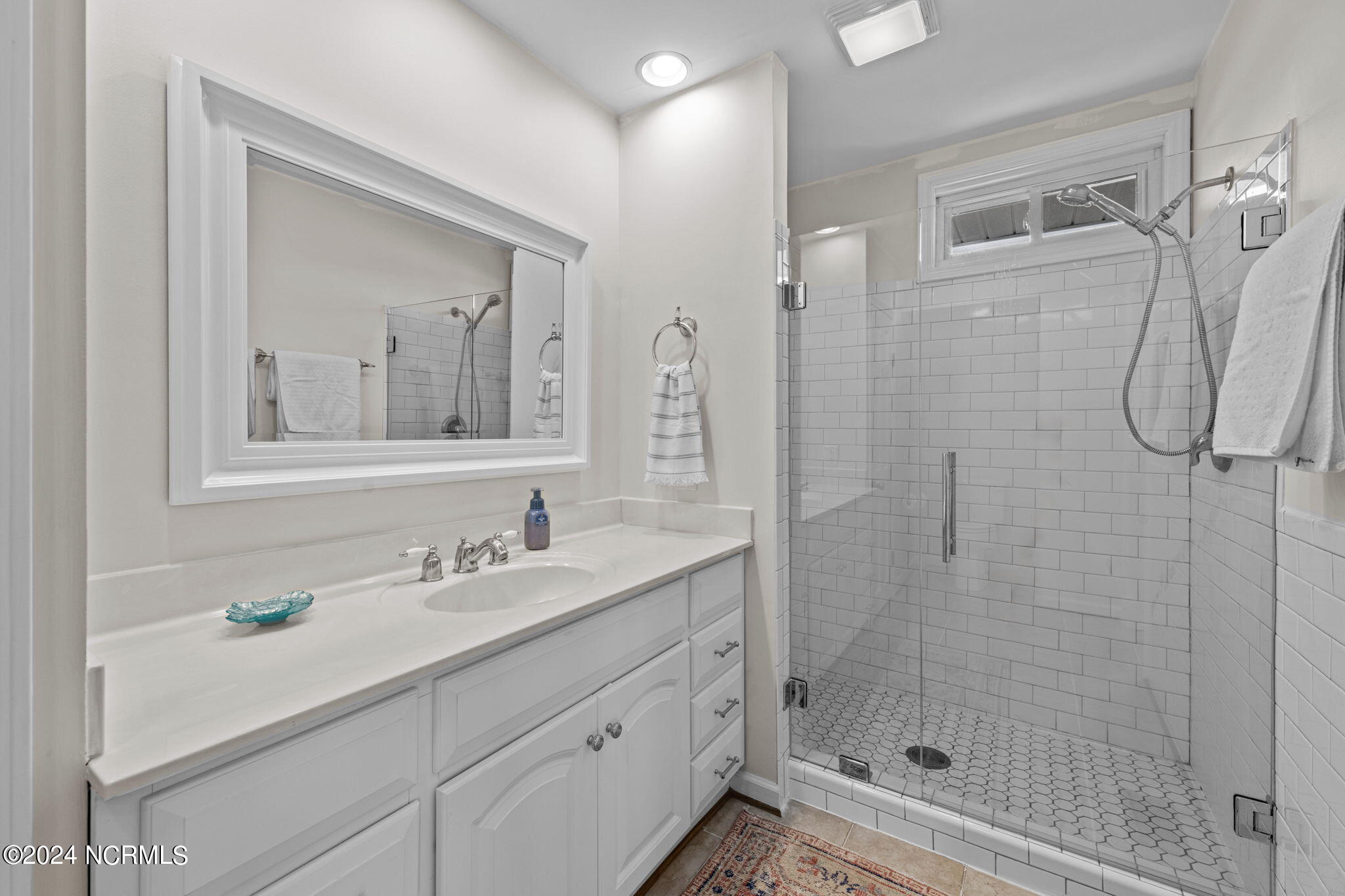 3772 Janiero Road Arapahoe, NC 28510 - Photo 33 of 54 primary en suite bathroom with new glass shower door