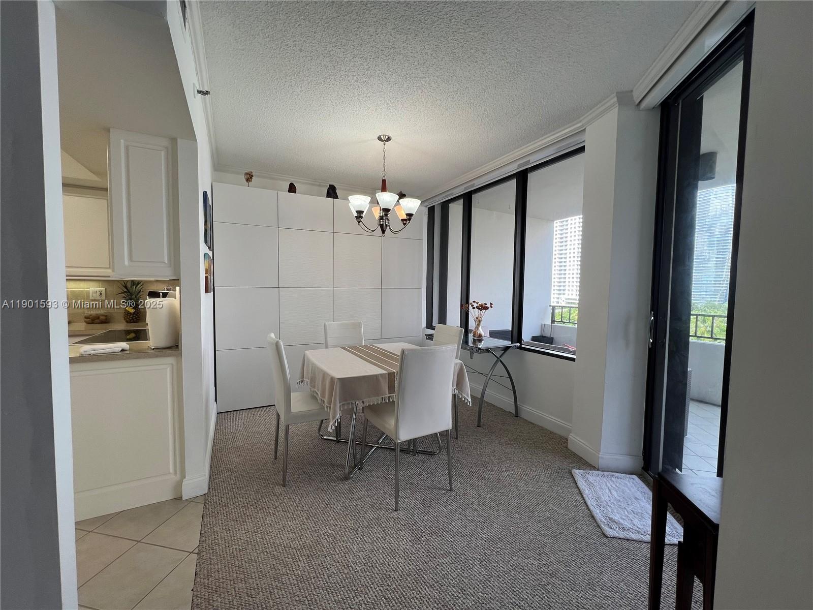 520 Brickell Key Drive, Unit A900 Miami, FL 33131 - Photo 14 of 58 a view of a dining room with furniture and window