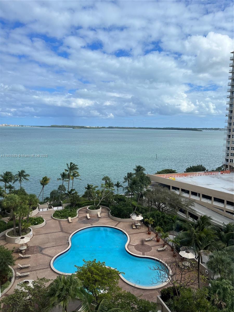 520 Brickell Key Drive, Unit A900 Miami, FL 33131 - Photo 54 of 58 a view of a swimming pool with lounge chair