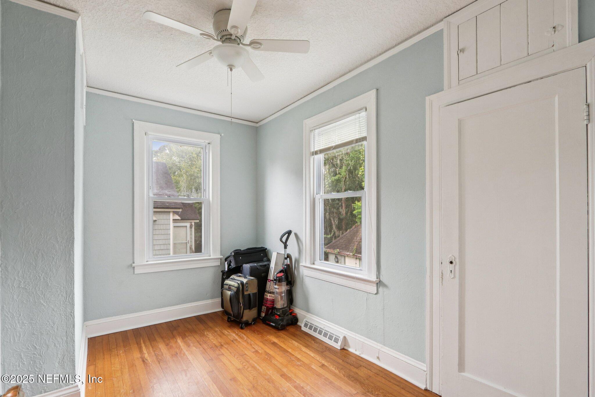 1605 Lorimier Road Jacksonville, FL 32207 - Photo 31 of 57 a view of a livingroom with a window and wooden floor