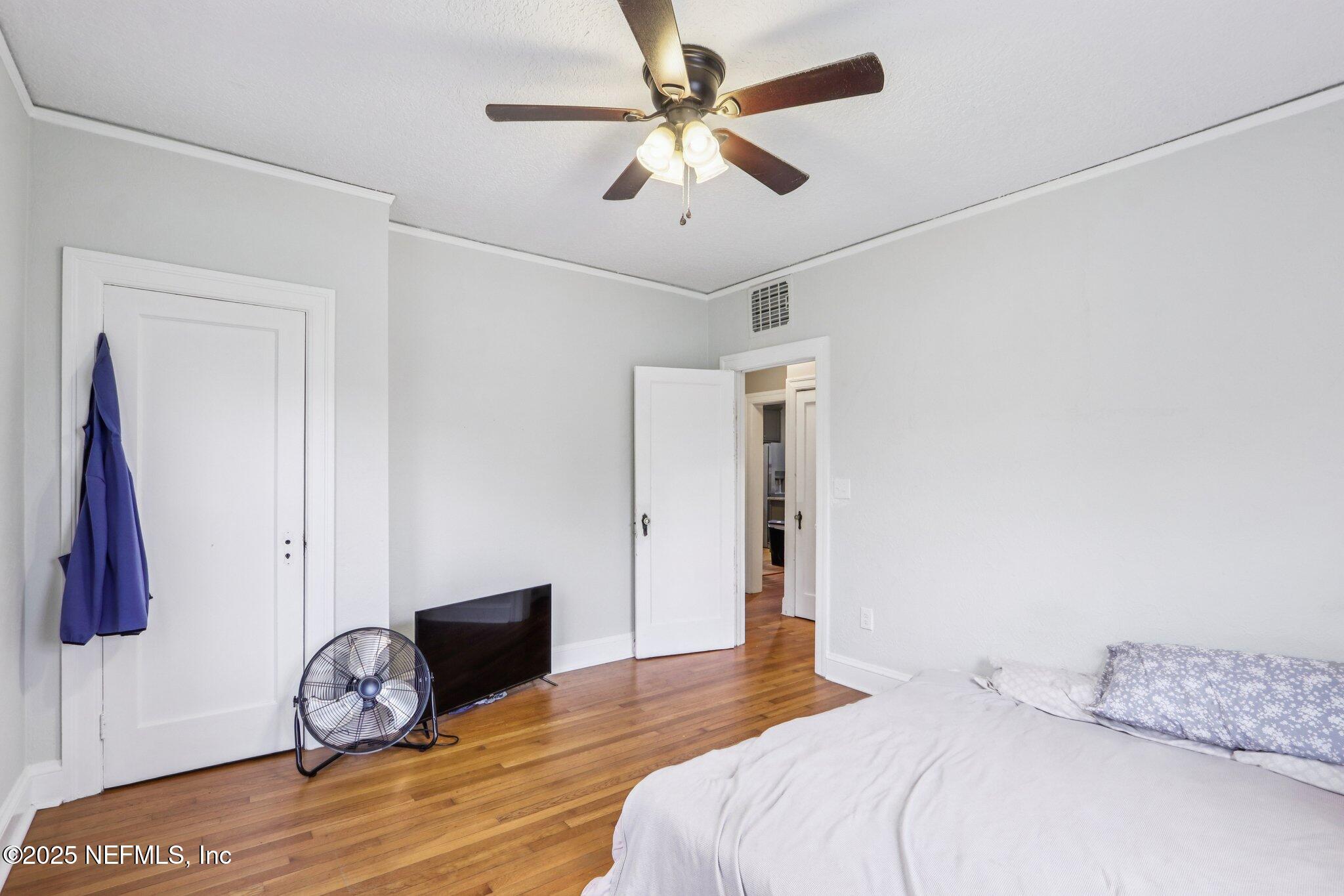 1605 Lorimier Road Jacksonville, FL 32207 - Photo 34 of 57 a bedroom with a bed and a window