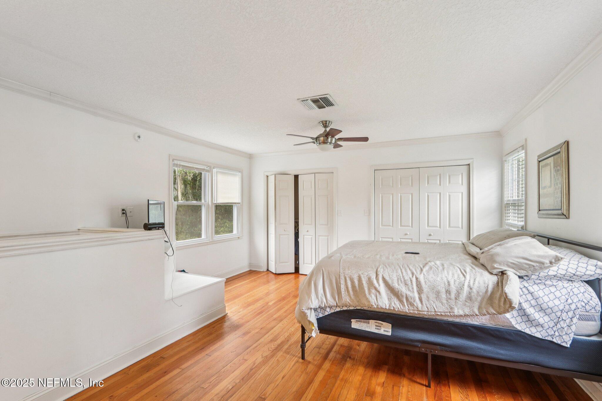 1605 Lorimier Road Jacksonville, FL 32207 - Photo 39 of 57 a living room with a bed furniture and next to a window