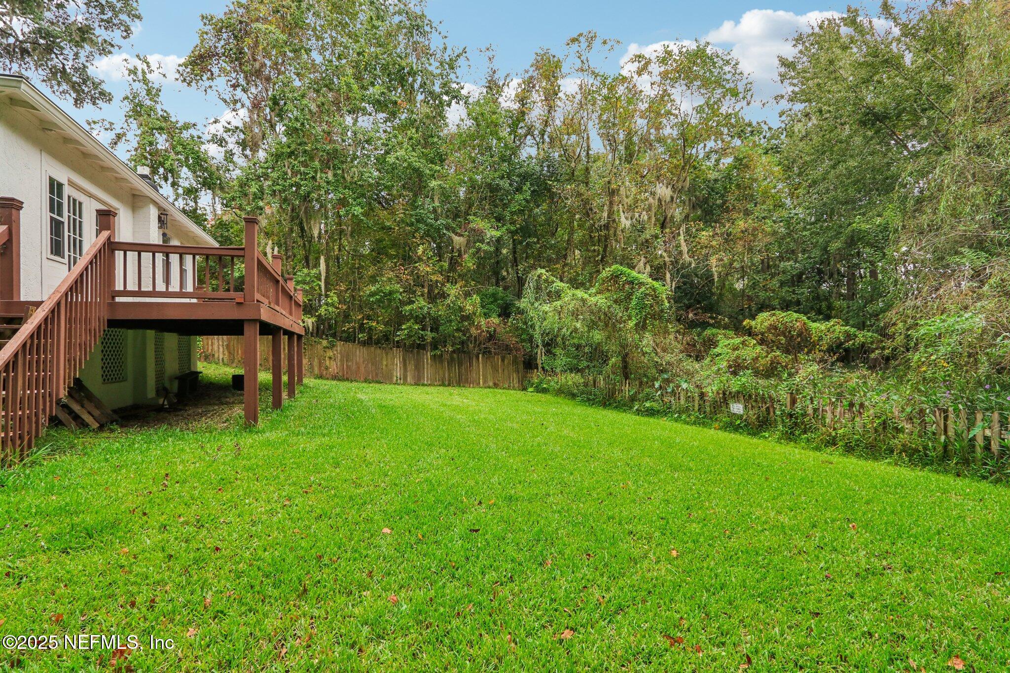 1605 Lorimier Road Jacksonville, FL 32207 - Photo 50 of 57 a view of house with backyard and a garden