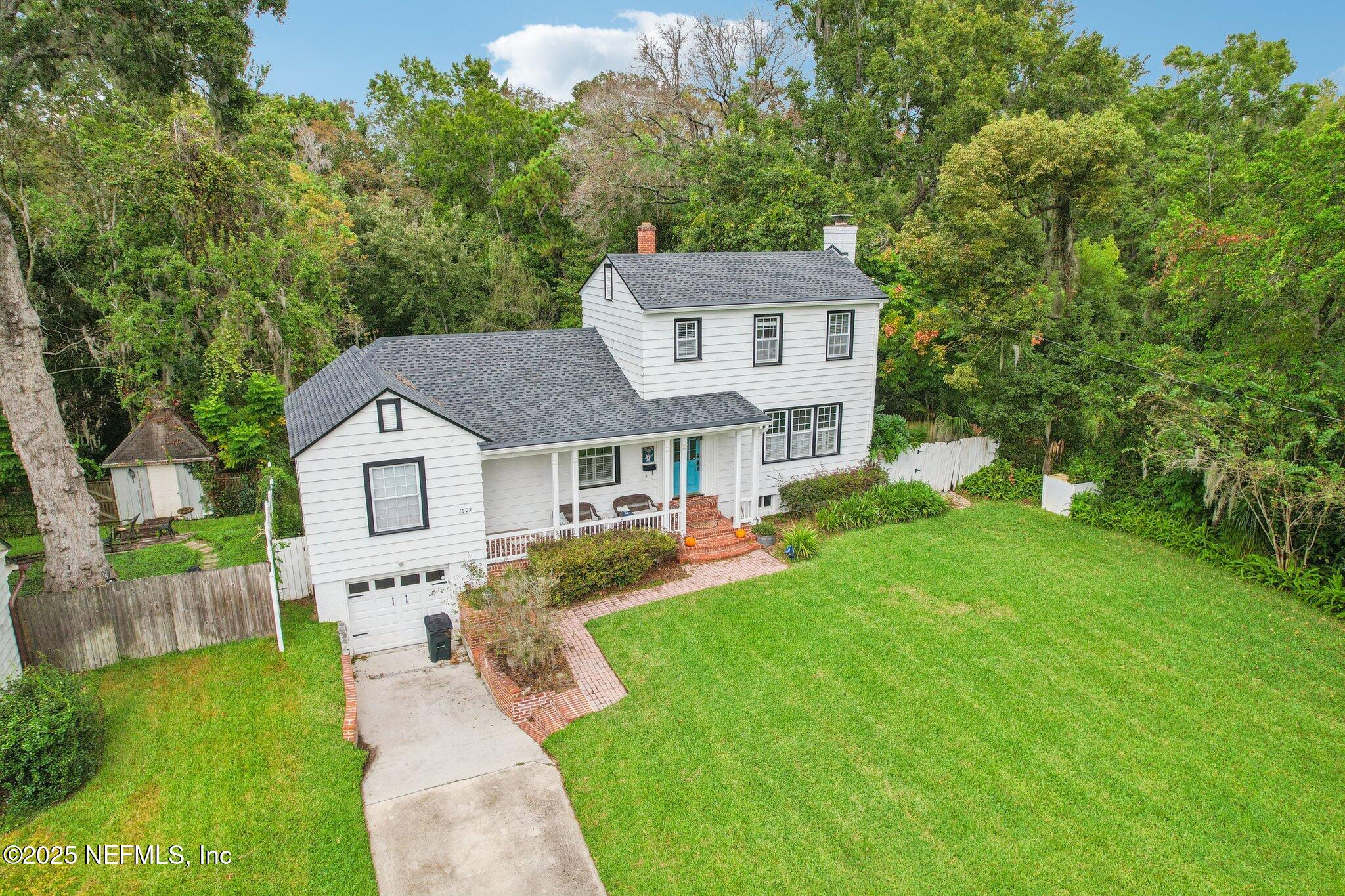 1605 Lorimier Road Jacksonville, FL 32207 - Photo 5 of 57 a front view of a house with a yard