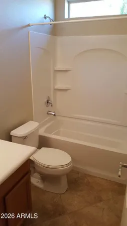 a view of a room with drop ceiling