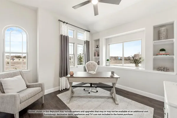 a living room with furniture a table and large window