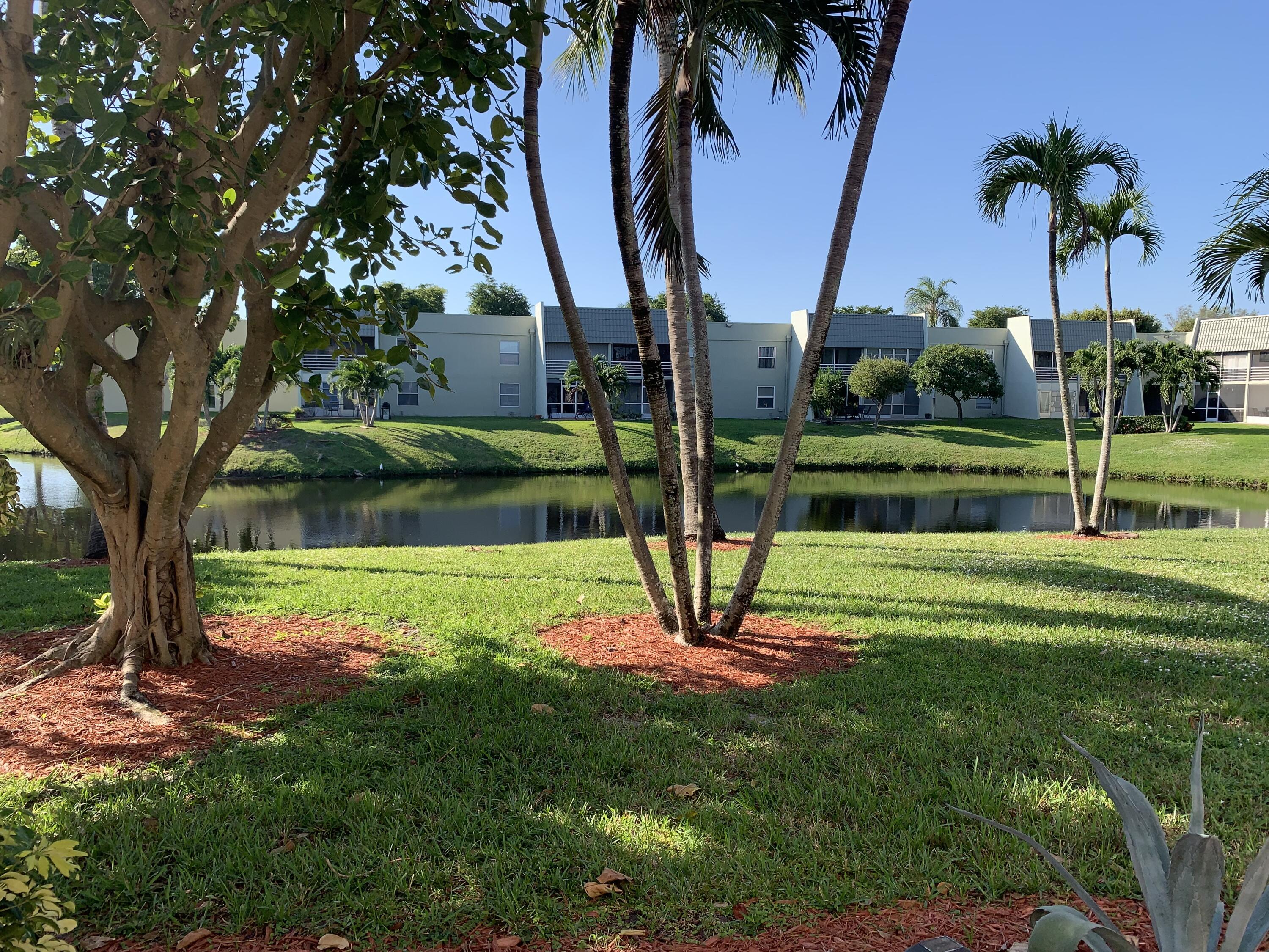 2500 Fiore Way, Unit 109 Delray Beach, FL 33445 - Photo 10 of 16 a view of a park
