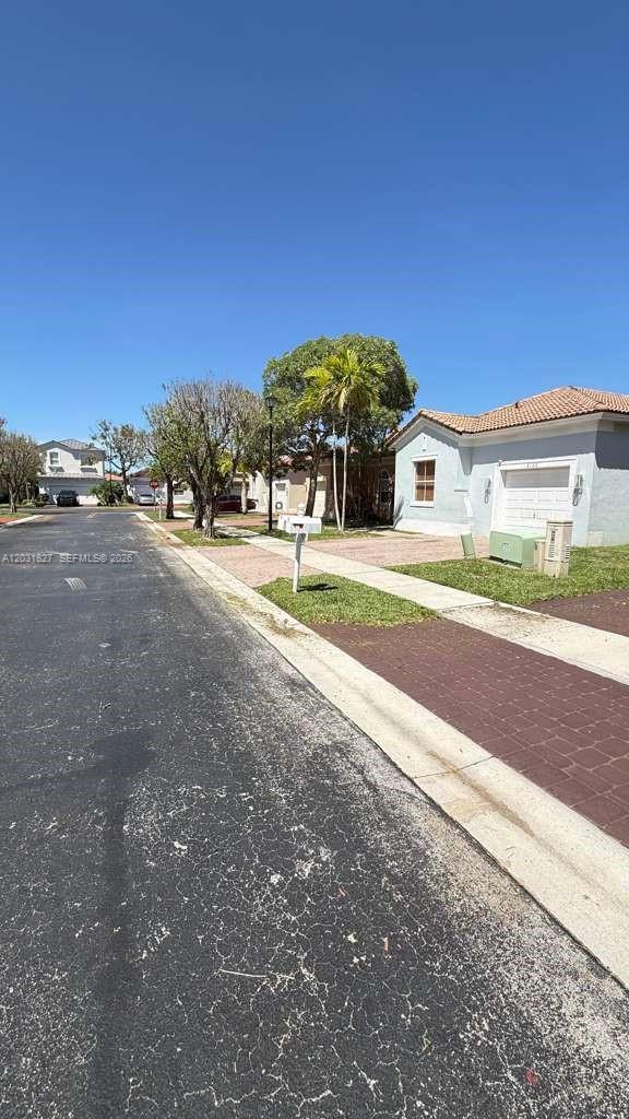2120 Northeast 37th Road, Unit 1 Homestead, FL 33033 - Photo 8 of 30 a view of a house with a street