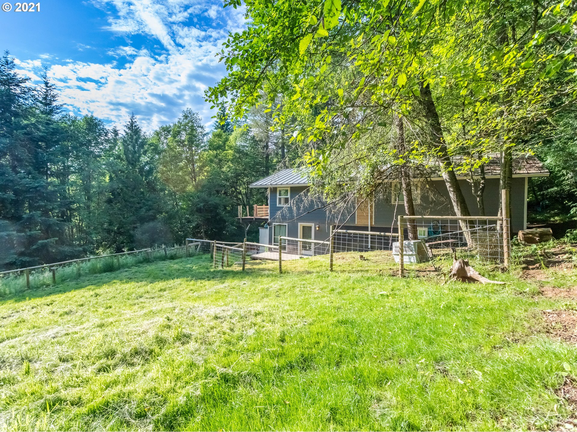 43900 Southeast Keisecker Road Sandy, OR 97055 - Photo 29 of 31 a view of backyard with a swimming pool and sitting area