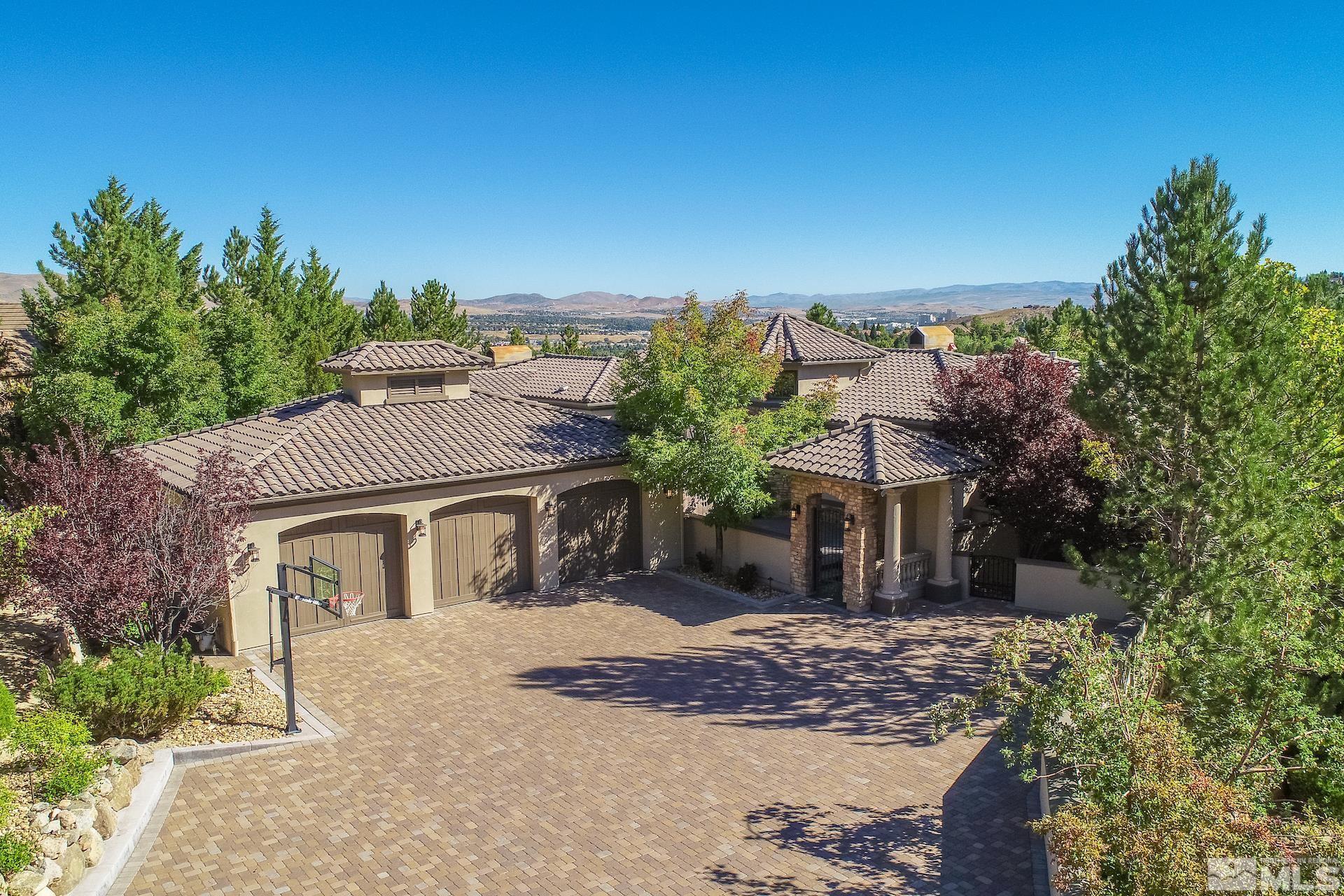 175 Hawken Road Reno, NV 89519 - Photo 1 of 40 a front view of a house with a yard