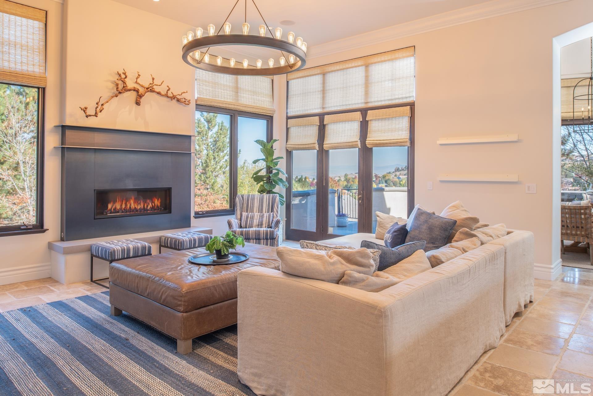 175 Hawken Road Reno, NV 89519 - Photo 15 of 40 a living room with furniture and a fireplace