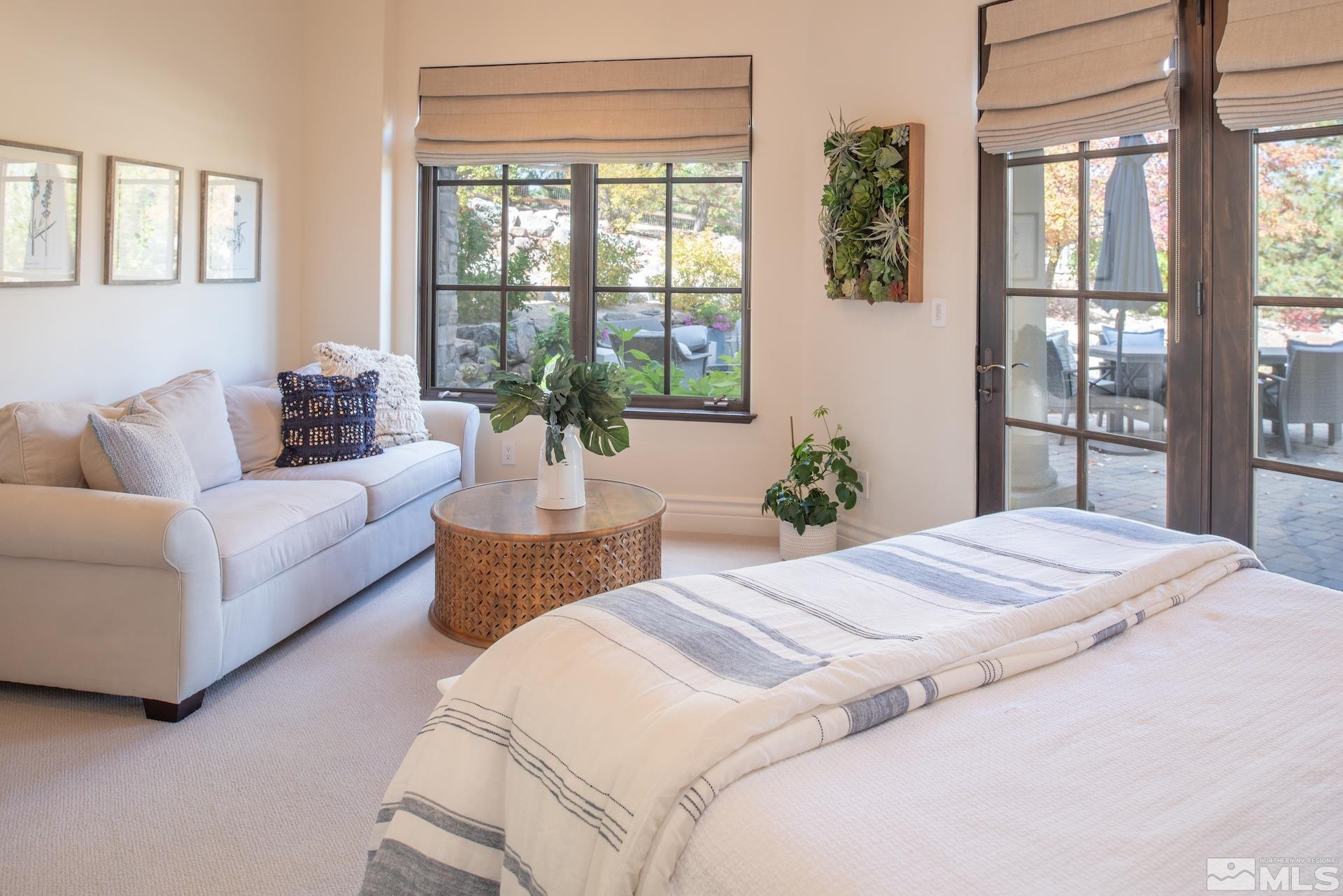 175 Hawken Road Reno, NV 89519 - Photo 39 of 40 a bedroom with a large bed and a large window
