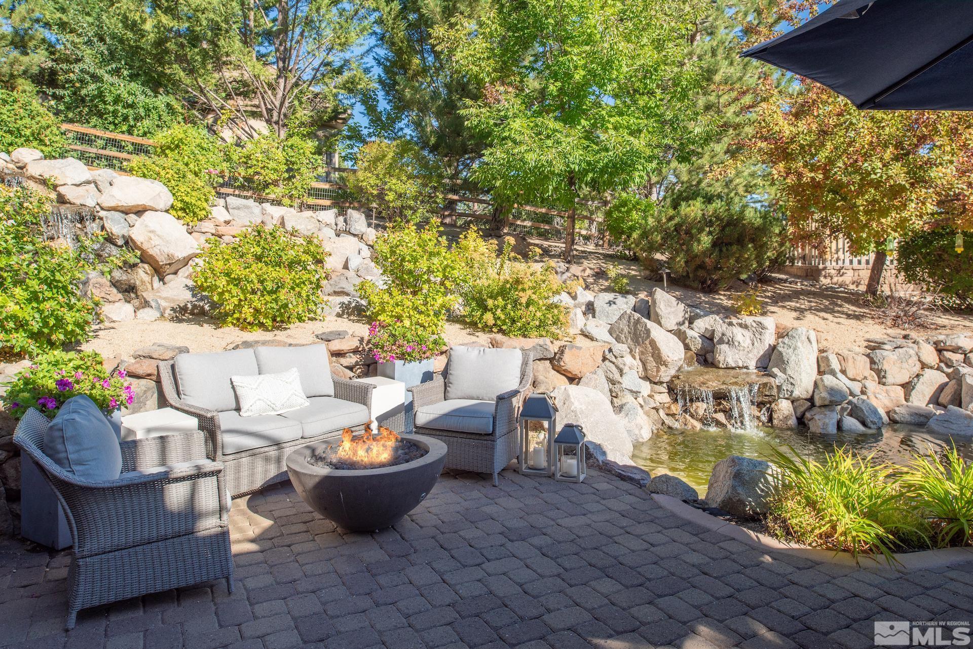 175 Hawken Road Reno, NV 89519 - Photo 4 of 40 a view of a backyard with furniture