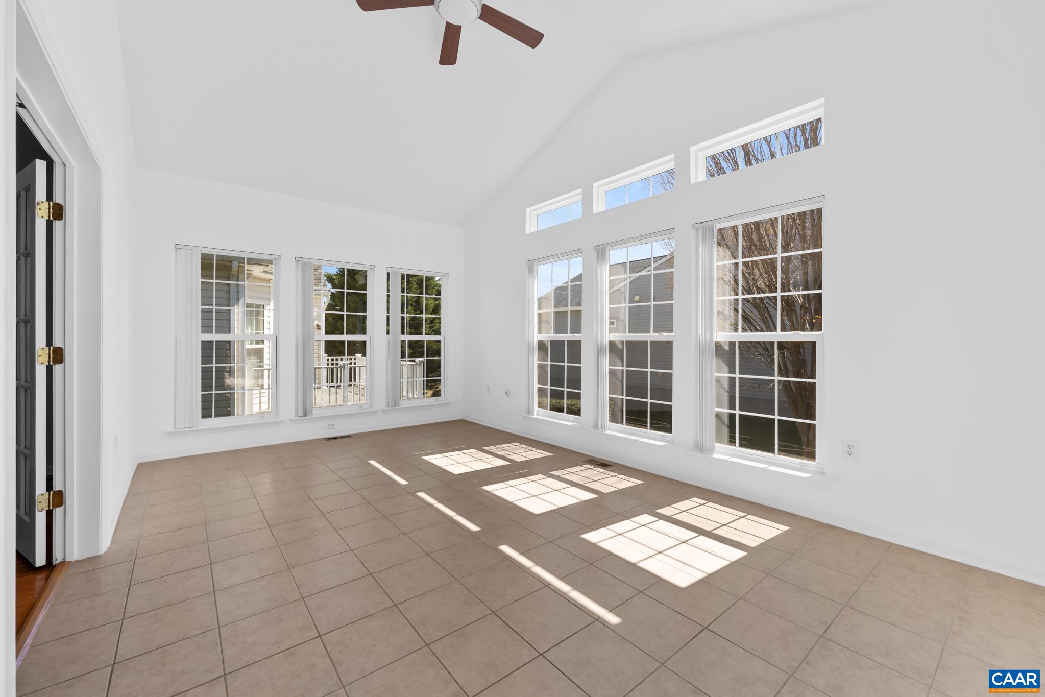 598 Mistland Trail Ruckersville, VA 22968 - Photo 20 of 69 Cathedral ceiling and door to the deck