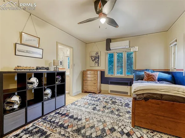 a kitchen with a sink cabinets and window