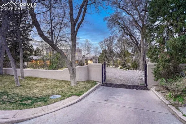 a view of a backyard of the house