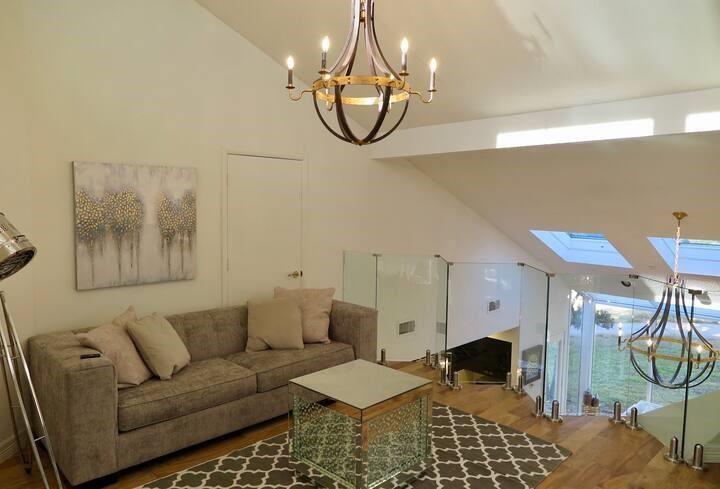 10827 St John Road Pilot Point, TX 76258 - Photo 25 of 40 a living room with furniture a dining table and a chandelier