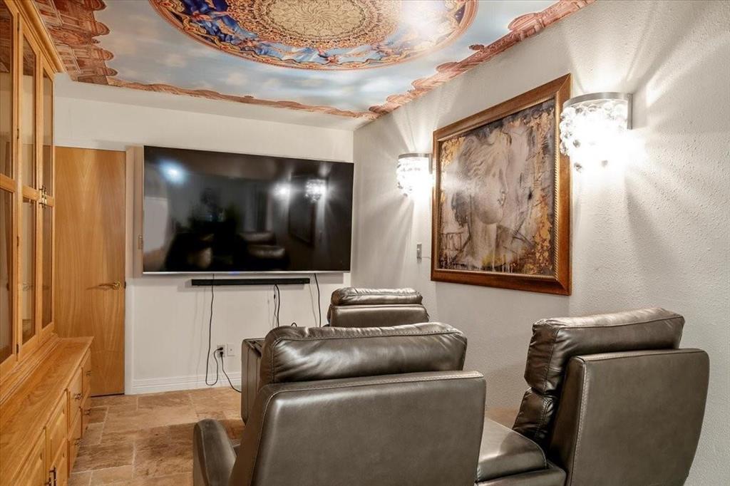 10827 St John Road Pilot Point, TX 76258 - Photo 29 of 40 a living room with furniture and a flat screen tv