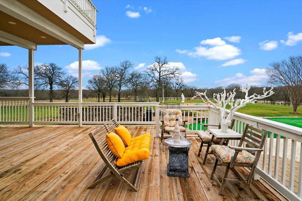 10827 St John Road Pilot Point, TX 76258 - Photo 32 of 40 a view of a balcony with furniture