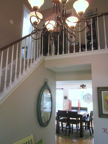 718 Old Hunt Road Fox River Grove, IL 60021 - Photo 3 of 25 a view of a livingroom with furniture and chandelier