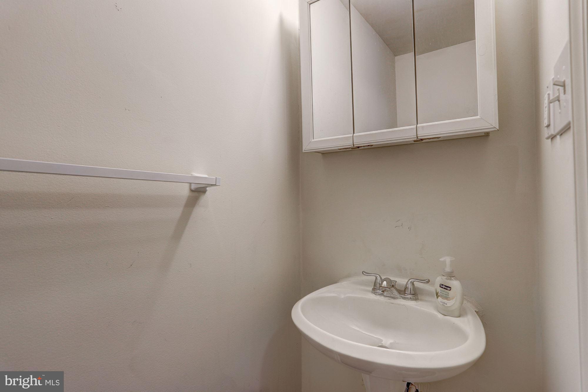 9409 Joleon Road Randallstown, MD 21133 - Photo 5 of 20 Main level powder room.