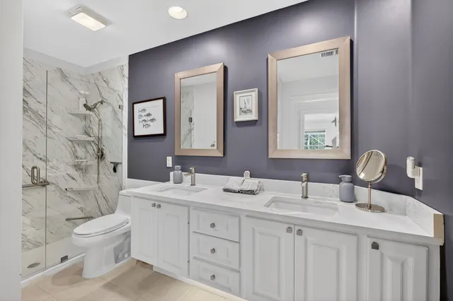 a bedroom with a bed and a table in it