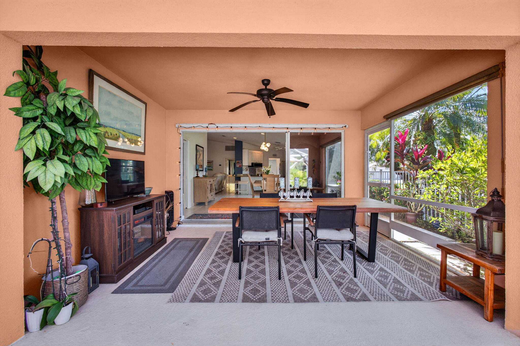 1035 Southwest Tamarrow Place Stuart, FL 34997 - Photo 26 of 42 a view of a dining room with furniture window and wooden floor