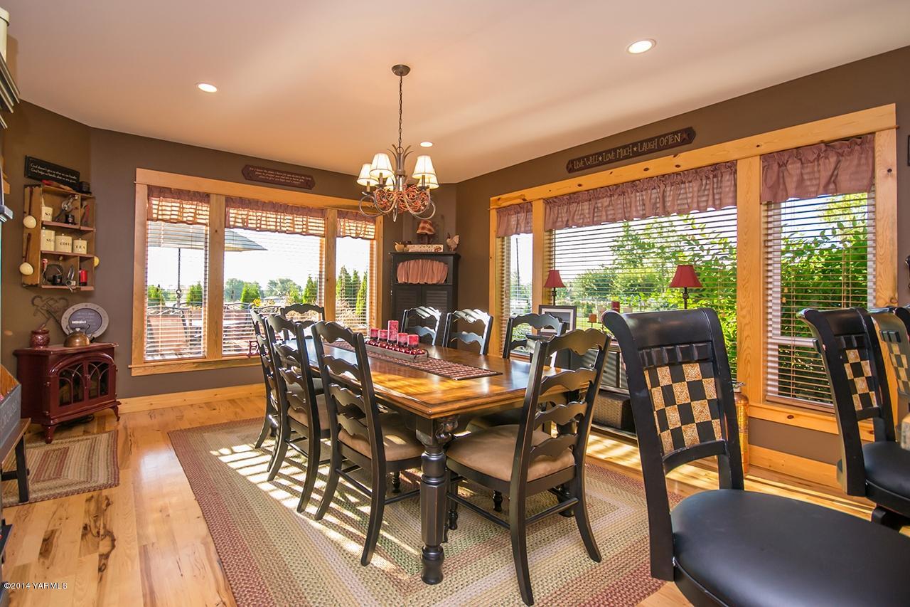 1292 Deeringhoff Road Moxee, WA 98936 - Photo 15 of 42 a view of a dining room with furniture window and outside view