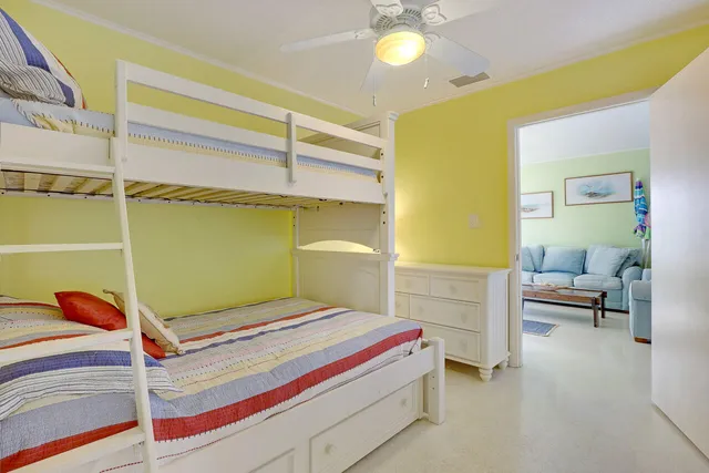 a bedroom with a bed and a cabinets