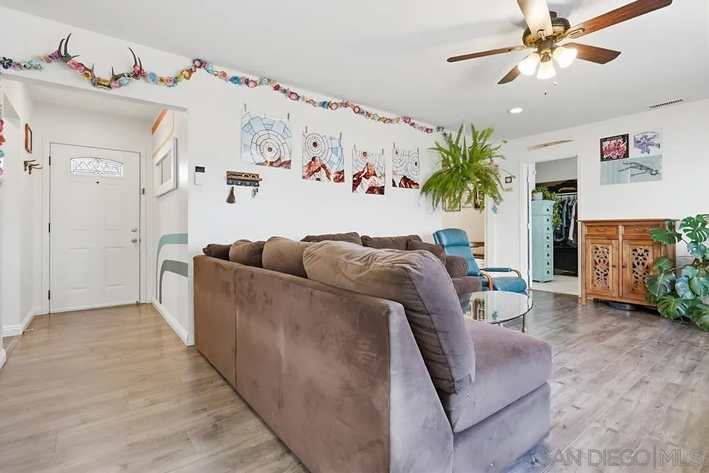712 Lemon Avenue Vista, CA 92084 - Photo 13 of 29 a living room with furniture and a white couch