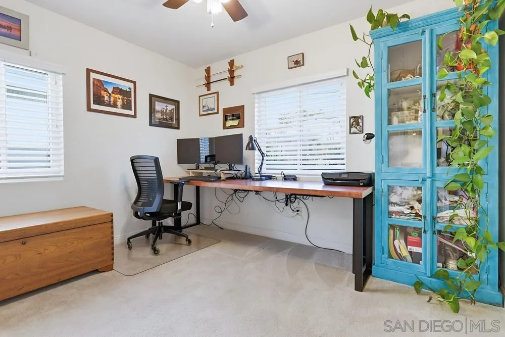 712 Lemon Avenue Vista, CA 92084 - Photo 20 of 29 a view of workspace with a window and couch