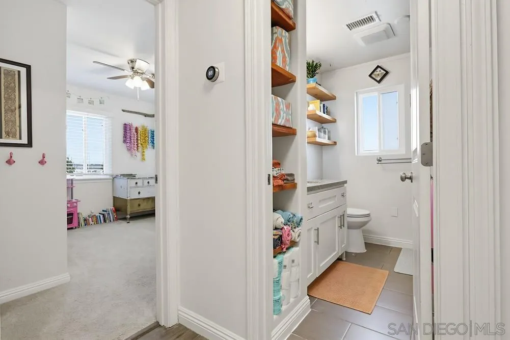 712 Lemon Avenue Vista, CA 92084 - Photo 24 of 29 a bathroom with a sink toilet and a shower