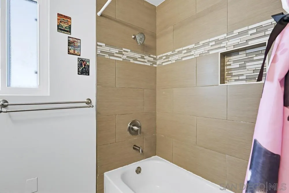 712 Lemon Avenue Vista, CA 92084 - Photo 25 of 29 a bathroom with a shower and a sink
