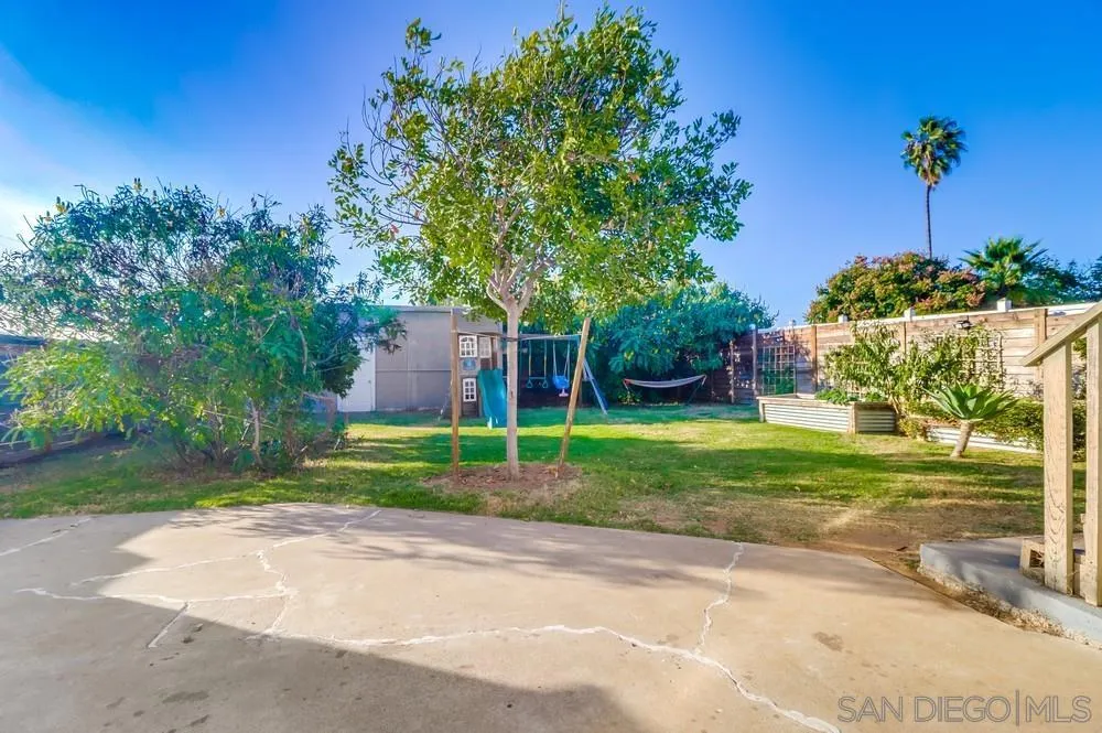 712 Lemon Avenue Vista, CA 92084 - Photo 29 of 29 a view of a backyard with plants and a yard