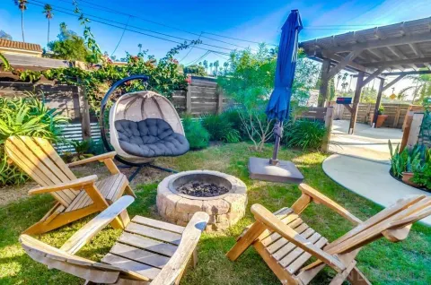 a view of yard from deck having patio