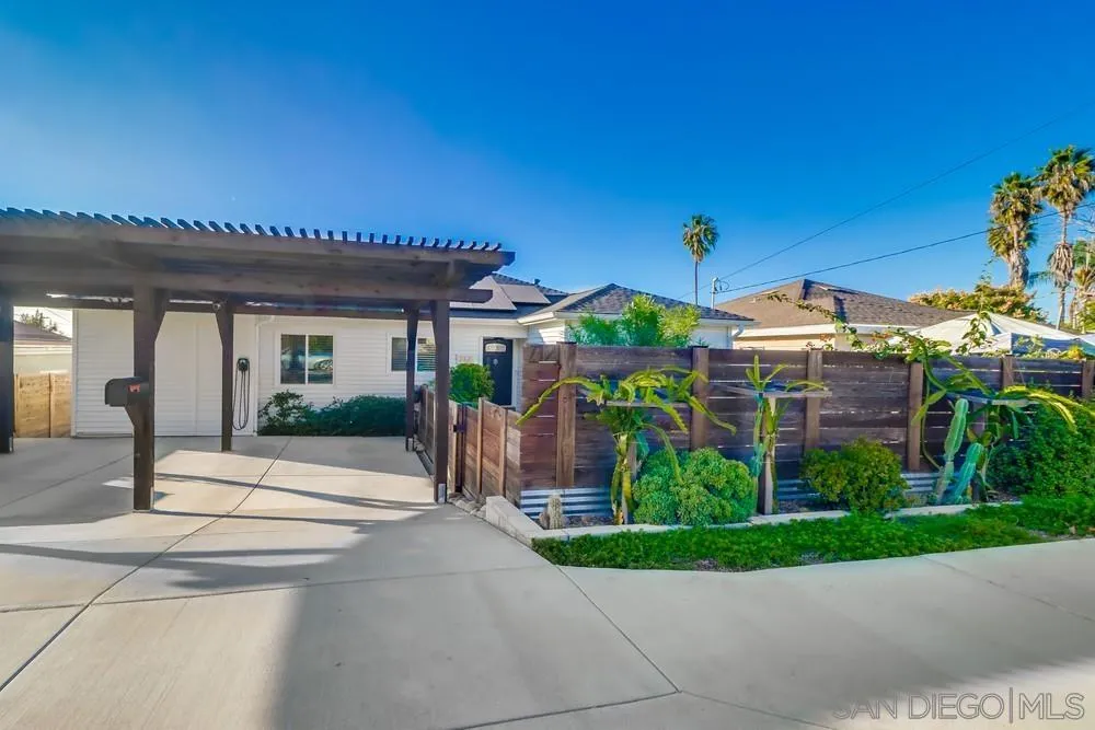 712 Lemon Avenue Vista, CA 92084 - Photo 10 of 29 a front view of a house with garden