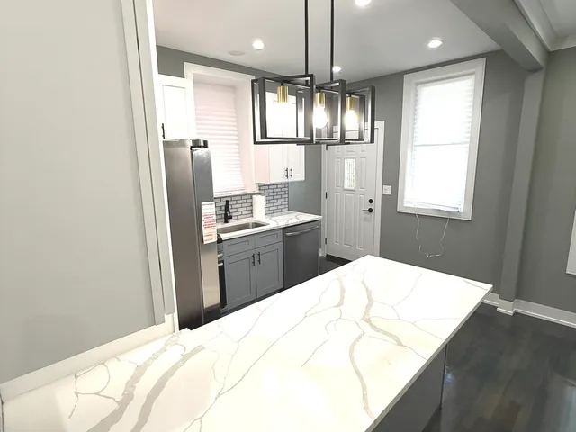 $355,000 | 7042 South Eberhart Avenue, Chicago, IL 60637