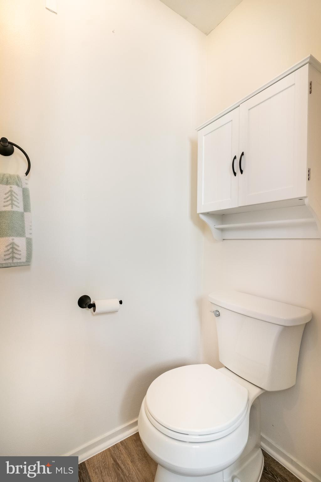 17411 Pipers Way, Unit 7 Olney, MD 20832 - Photo 14 of 22 a white toilet sitting next to a shower