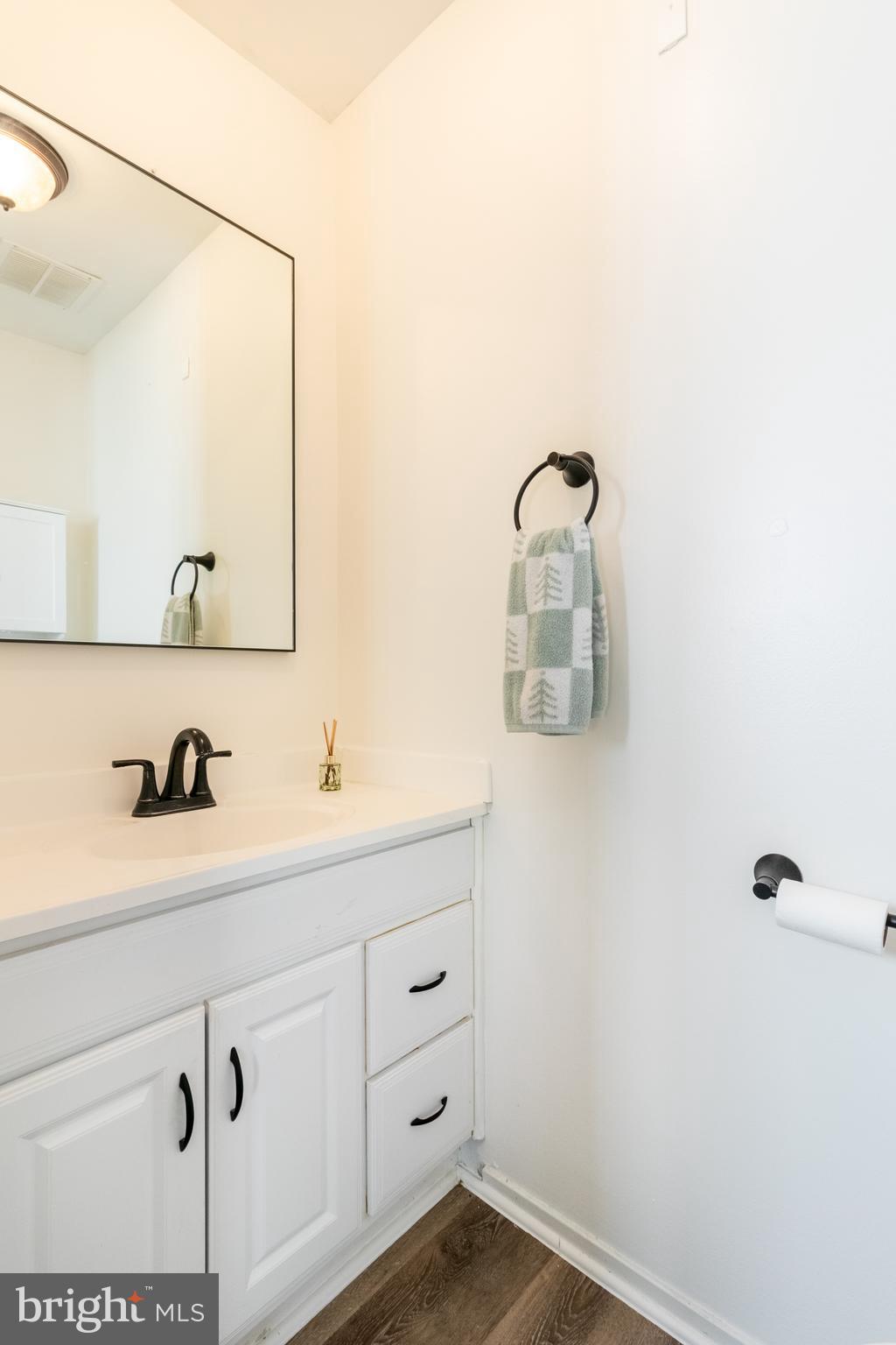 17411 Pipers Way, Unit 7 Olney, MD 20832 - Photo 15 of 22 a bathroom with a sink vanity and mirror