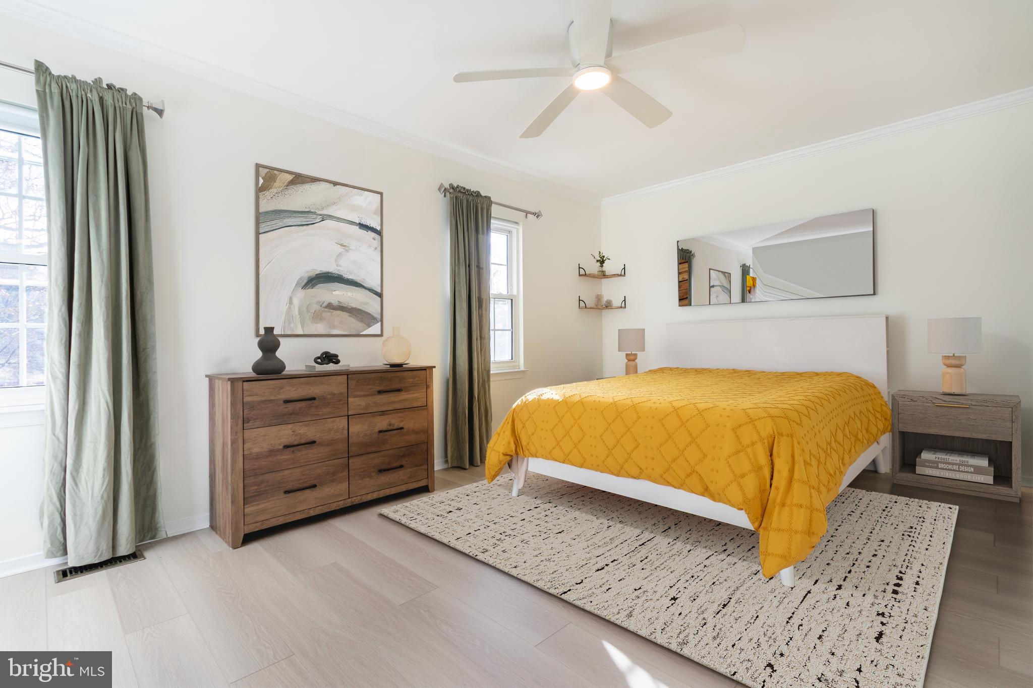 17411 Pipers Way, Unit 7 Olney, MD 20832 - Photo 16 of 22 a bedroom with a bed and a dresser