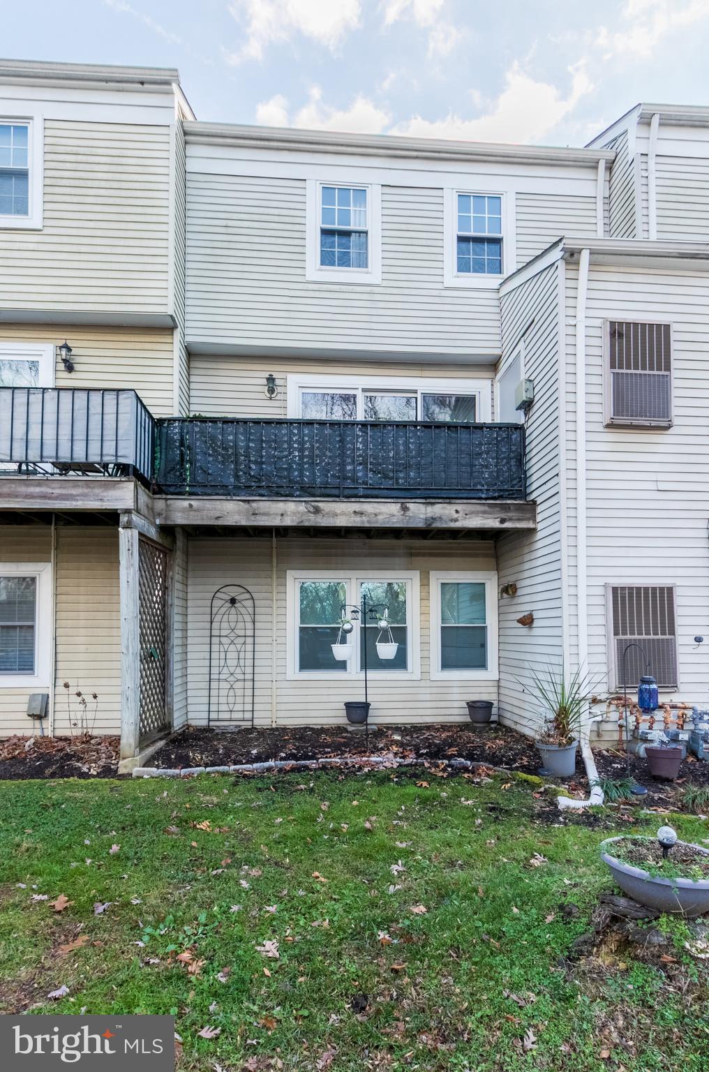 17411 Pipers Way, Unit 7 Olney, MD 20832 - Photo 22 of 22 a view of a house with backyard and sitting area